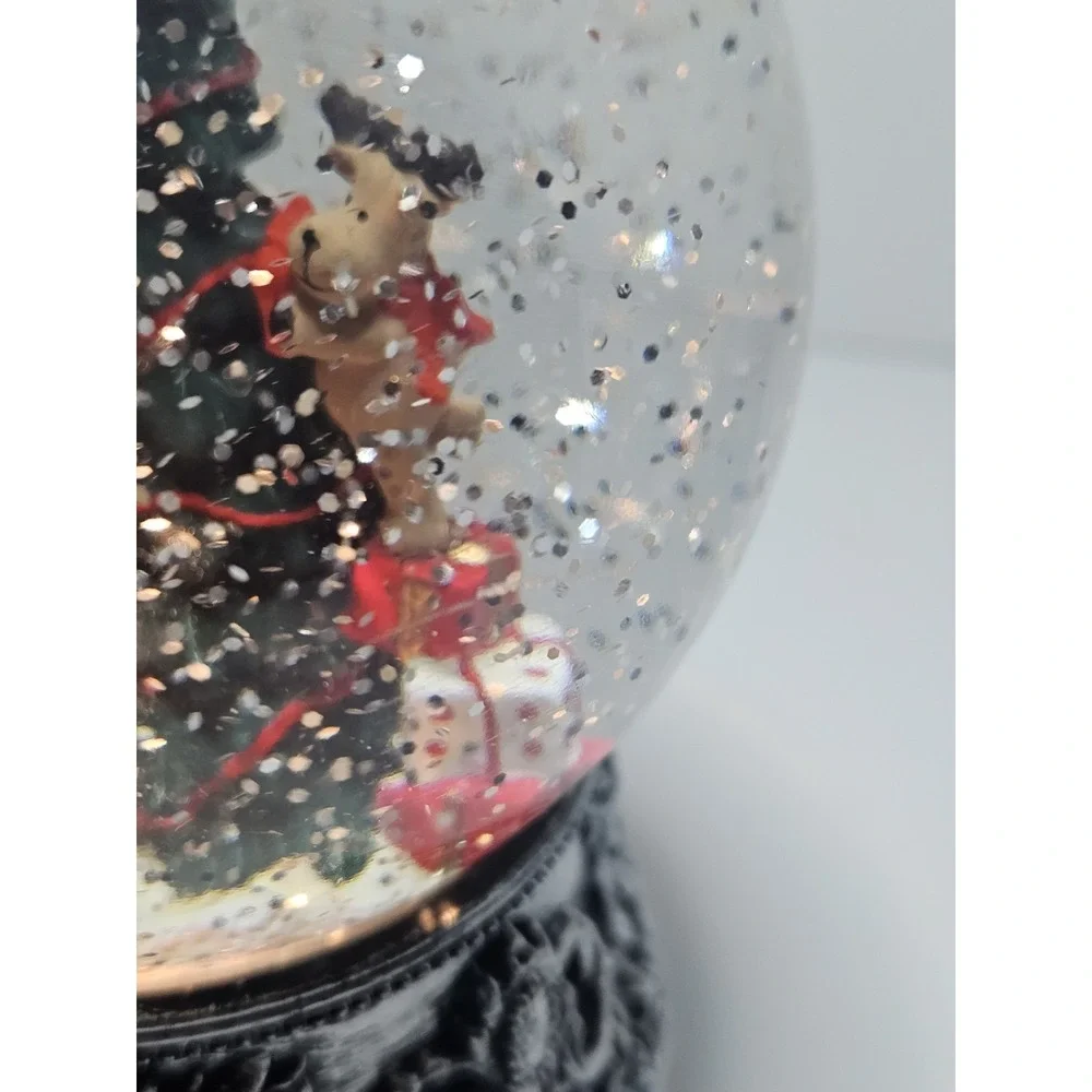 Lighted Christmas Tree Snow Globe Swirling Glitter Plastic Dome Black Filigree